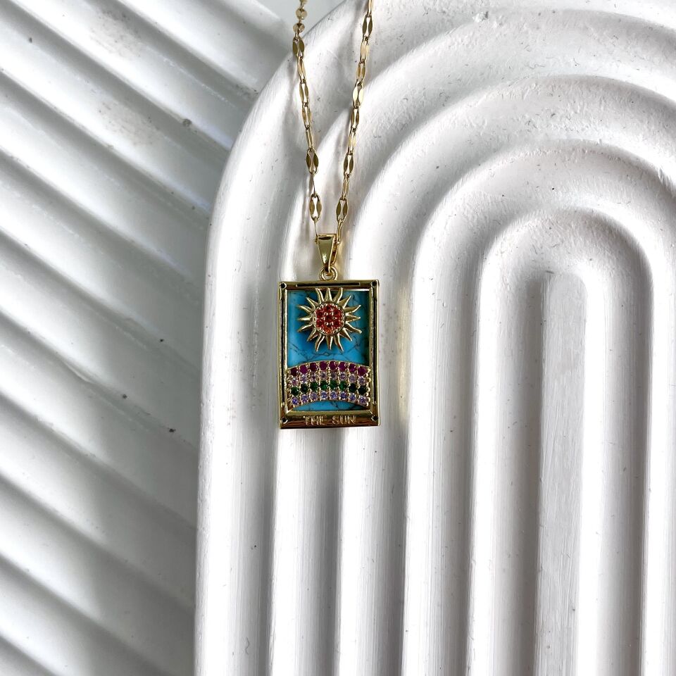 Çelik Güneş Desenli Kolye