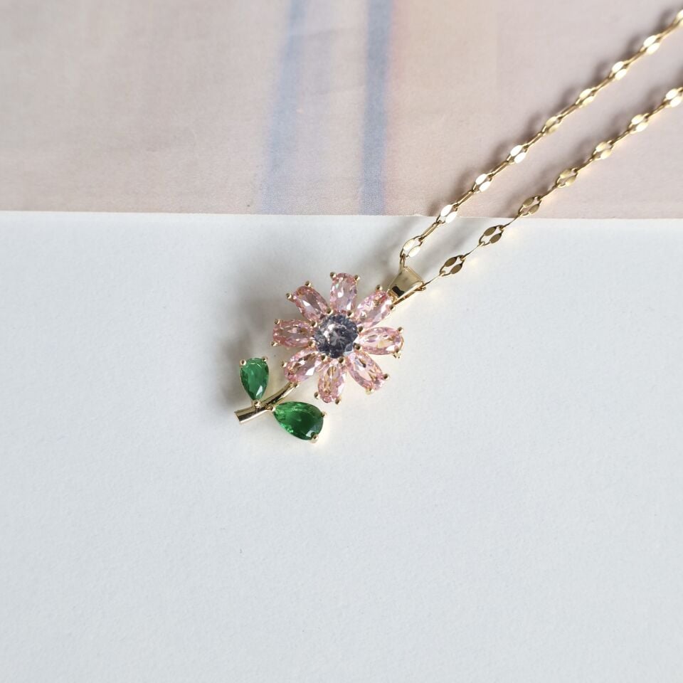 Çelik Dönen Çiçek Kolye