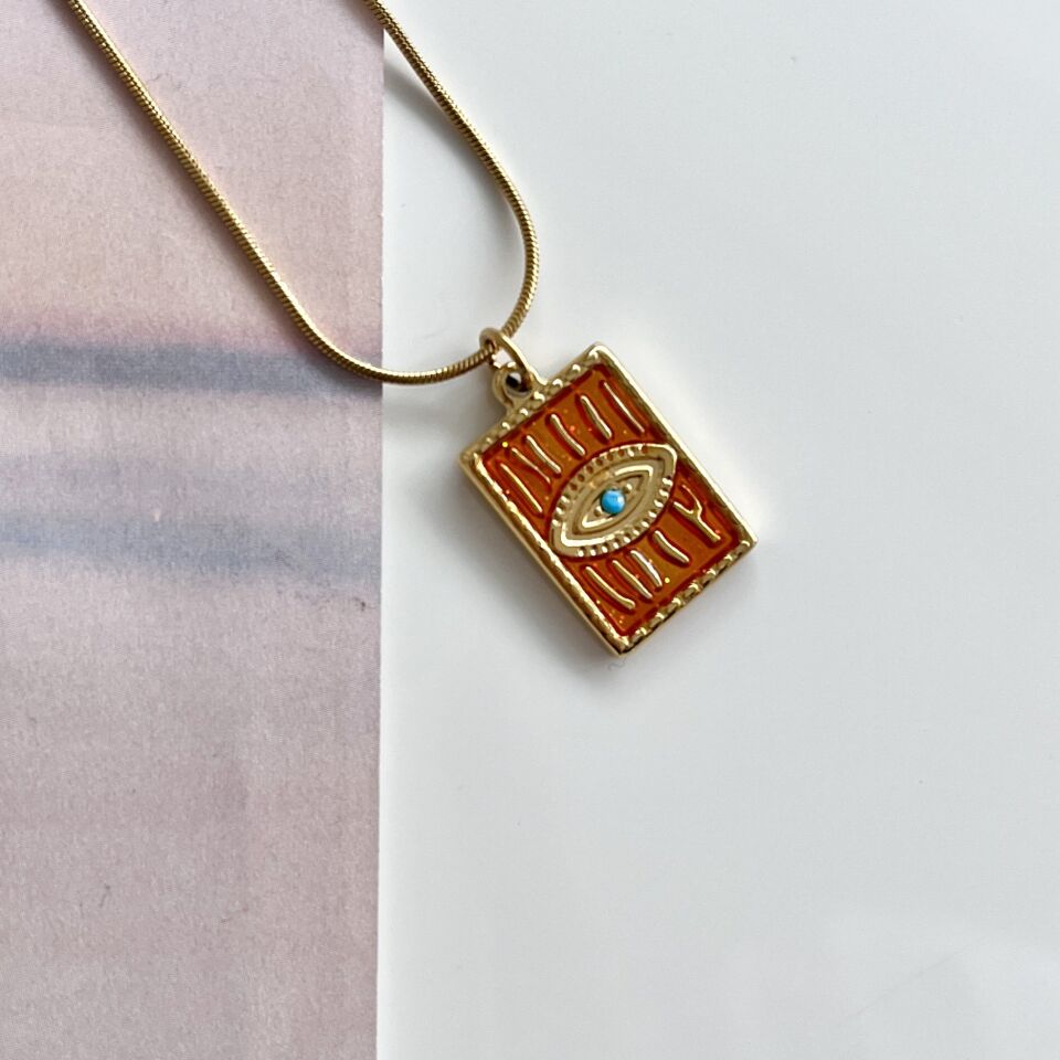 Çelik Turuncu Göz Kolye